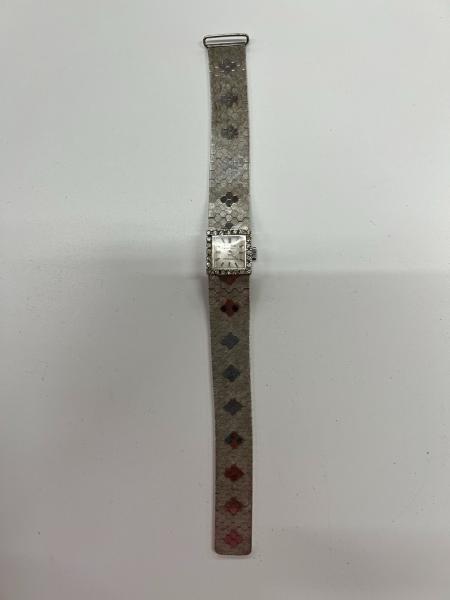 Omega - analoge Damenarmbanduhr aus 1750er Weißgold mit Diamanten